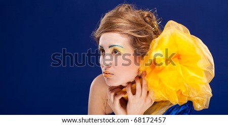 Woman in blue on blue background