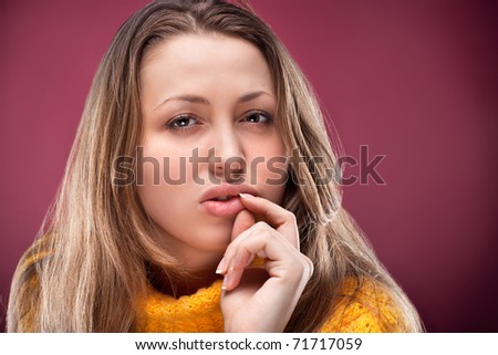 stock photo Perfect blonde on red background