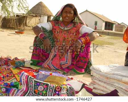a tribal indian woman selling handicraft products