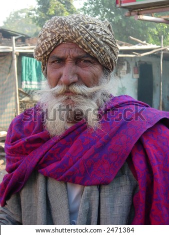 an old man in a village in india