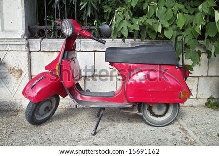 Red vintage motor-scooter