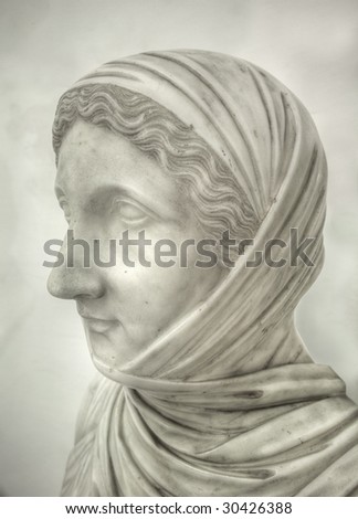 Sculpture of a woman\'s head, HDR-based tone-mapped image