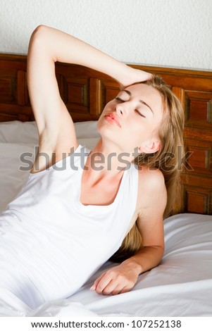 young woman on the bed