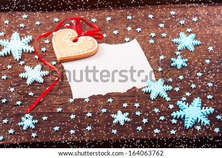 Christmas card. Christmas ornaments, heart shaped handmade cookies.  Free space for your text