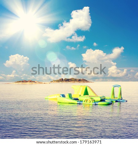 Summer Vacation at Beach. Sun, sea and hotel on beach. Unusual view of summer beach. Water Sports, Water Park at Sea, Relax, Sea Travel. Adventures
