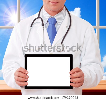 Doctor working with tablet, closeup. Concept of medicine, health care, diagnostics.