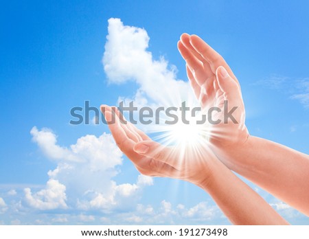 Man\'s hands reach for sky. Prayer at dawn Hand concept.Two hands protecting something