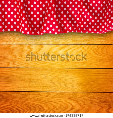 Wood texture background. Pure notebook for recording menu, recipe on red checkered tablecloth tartan. Wooden table close up view from top