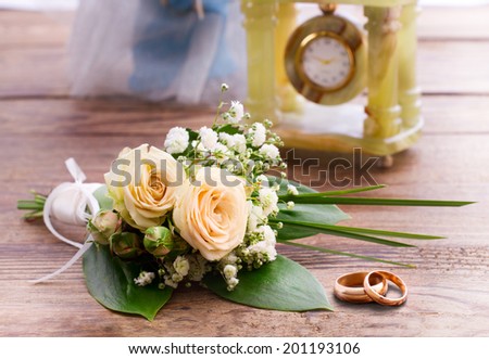 Flowering branch with white delicate flowers on wooden surface. Declaration of love, spring. Wedding card, Valentine\'s Day greeting. Wedding bouquet, background. Empty wooden tabletop Space for text