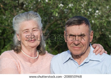 Happy and smiling senior couple in love. Happy couple portrait, closeup. Elderly couple walking.