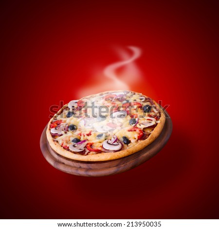 Food. Hot pizza isolated. Pizza with tomato, salami and olives on wooden table.