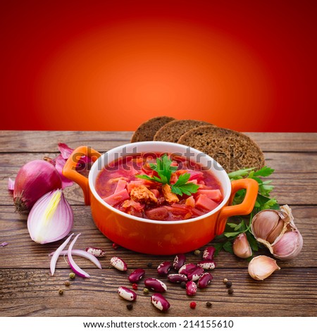 Ukrainian national Red Borscht on wooden surface, menu cooking recipes. Food, spices for cooking.