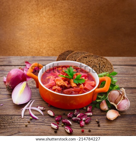 Ukrainian national Red Borscht on wooden surface, menu cooking recipes. Food, spices for cooking.
