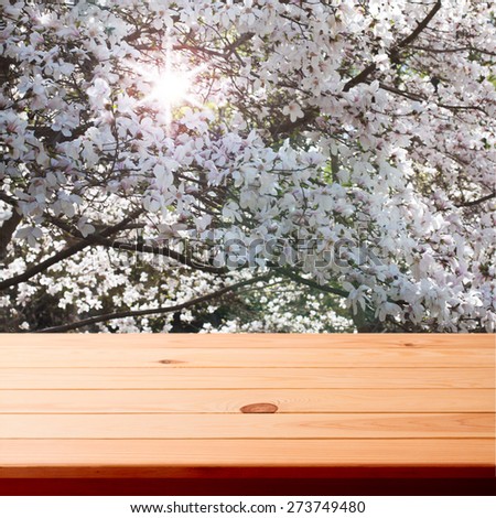Empty wooden desk for product montage texture background wallpaper. Stand for product showcase. Spring background