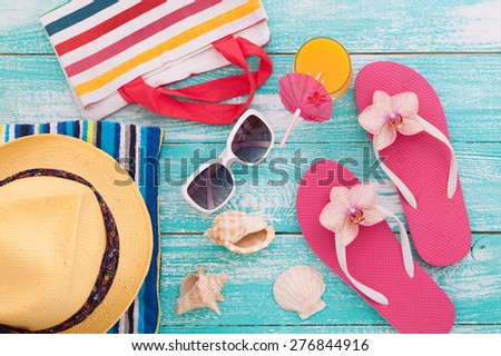 Sandy beach on sunny day with wooden walkway and beach accessories mock up for design