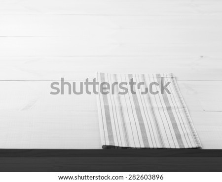 Empty wooden deck table with tablecloth for product montage. Kitchen interiors. Flat mock up for design. Black and White