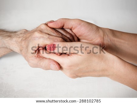 Care is at home of elderly. Space for text. Senior man, woman with their caregiver at home. Concept of health care for elderly old people, disabled. Elderly man.