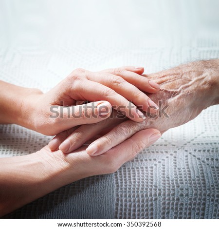 Care is at home of elderly. Senior man, with their caregiver at home. Concept of health caring for elderly old people, disabled. Elderly man.