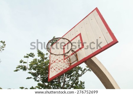 old basketball hoop without the net hang on it