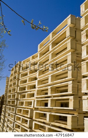 Wooden shipping pallets with sky background