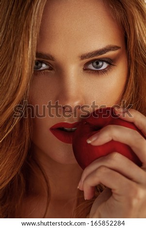 Picture Of Young Beautiful Woman With Red Apple