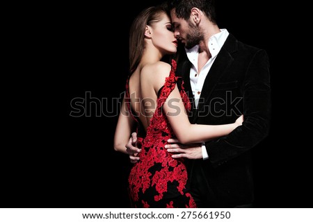Fashion photo of sexy elegant couple in the tender passion