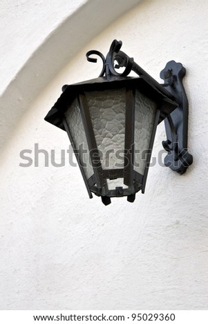 Outdoor Lamp on a white church wall