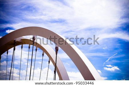 Steel arches against the blue sky. Shot from London, England. Copy space