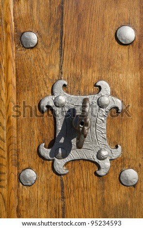 Lock with key on a church door