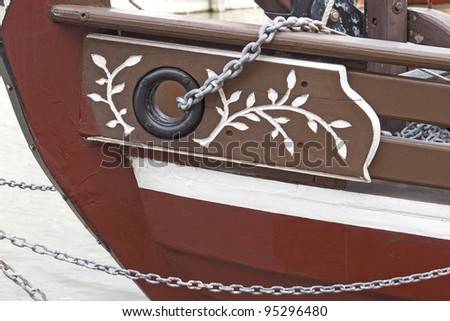 Bow with anchor chain on old sail boat