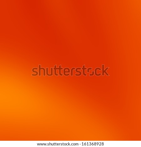 fire: abstract blurred orange background with a highlight in it