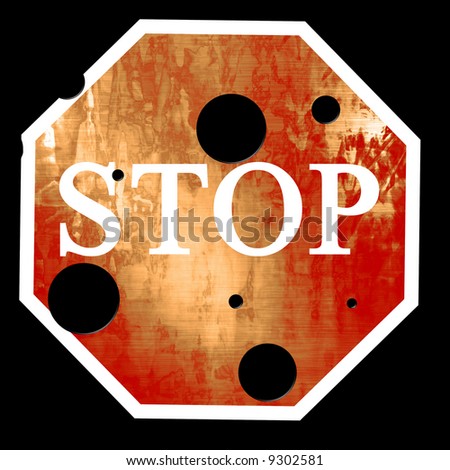 Stop sign with bullet holes