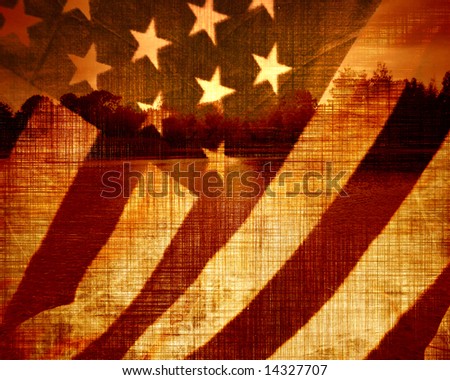 american flag waving in the wind. worn american flag waving