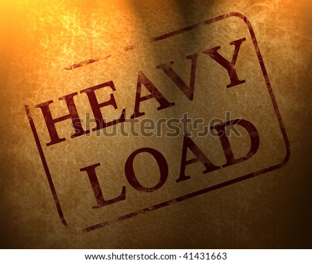 red stamp with heavy load written on it