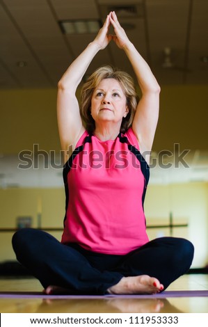 Mature Woman in Yoga Prayer Pose