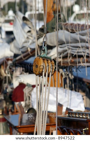 wooden pulley and ropes yacht detail from antique sail yacht