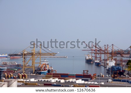 shipping industry cargo ship and containers at the port of piraeus athens greece no visible logos on containers