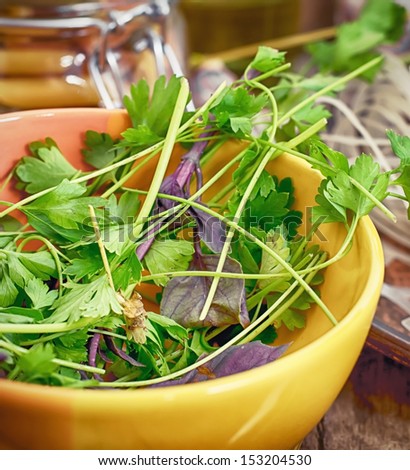green salad-herb seasoning in the yellow bowl