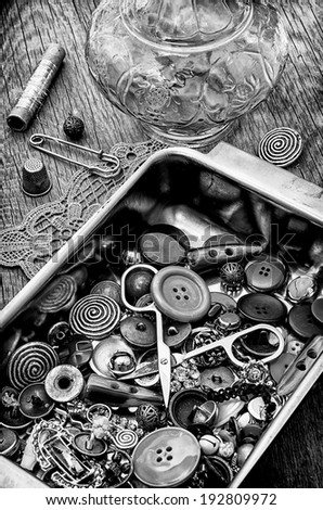 silver platter buttons and sewing tools