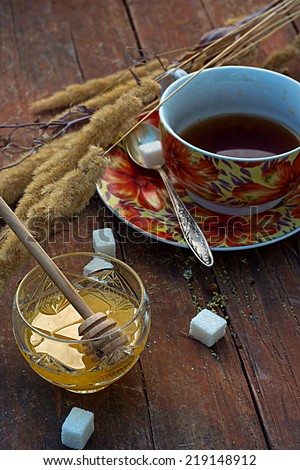 Cup of tea and raw honey