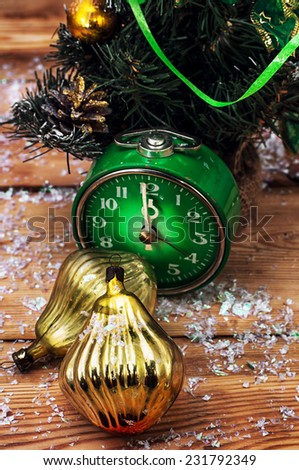 postcard with green old-fashioned clock and Christmas ornaments
