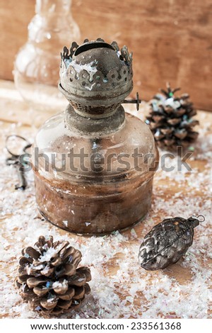 old-fashioned kerosene lamp,Christmas toys,pine cones