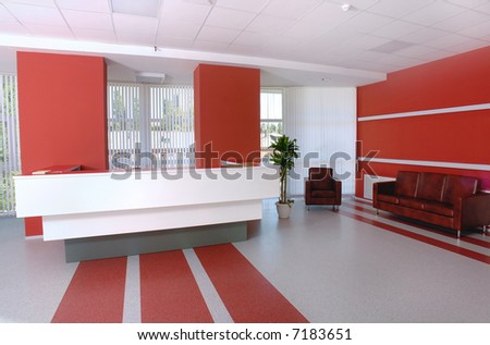 Business office reception in white and red colors