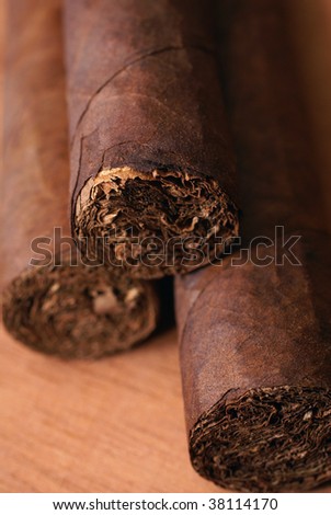 Natural background from Cuban cigars in brown color.