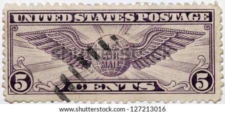UNITED STATES - CIRCA 1931: Five Cent Airmail stamp printed in United states (USA), shows Winged Globe , circa 1931