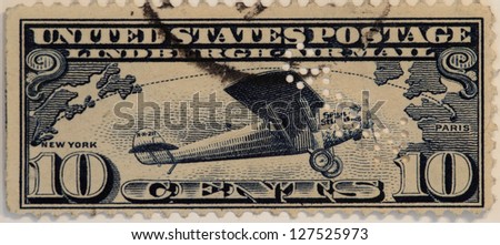 UNITED STATES - CIRCA 1927: Ten Cent Airmail stamp printed in United states (USA), Lindbergh, New York to Paris, circa 1927