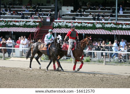 SARATOGA SPRINGS - August 17: C. Velasquez Aboard Dancing Tin Man in the Post parade Before the Sixth race August 17, 2008 in Saratoga Springs, NY.