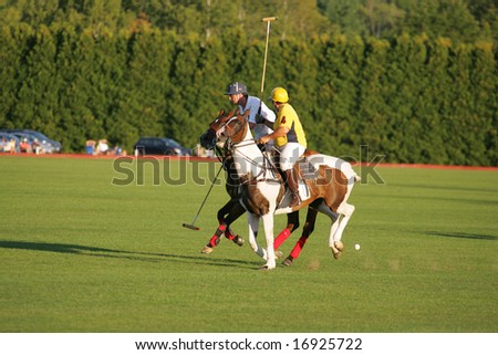 SARATOGA SPRINGS - August 27: Unidentified Polo Players in fast Action during match at Saratoga Polo Club August 27, 2008 in Saratoga Springs, NY.