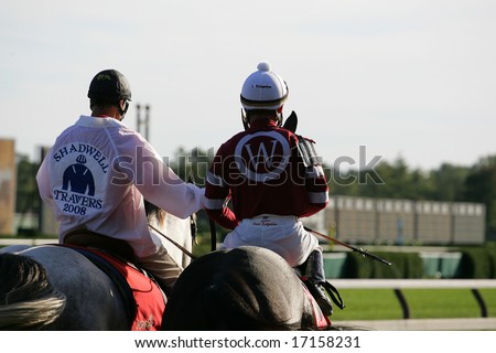 SARATOGA SPRINGS - August 23: Shawn Bridgmohan Aboard Pyro waiting with his pony Boy to go to Post before the 139th Running of the Travers Stakes August 23, 2008 in Saratoga Springs, NY.