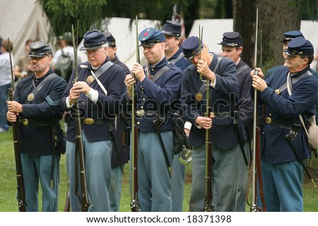 MENANDS - September 13: Union Soldiers fixing Bayonets During a Civil War Reenactment at the Albany Rural Cemetery on September 13, 2008 in Menands, NY.